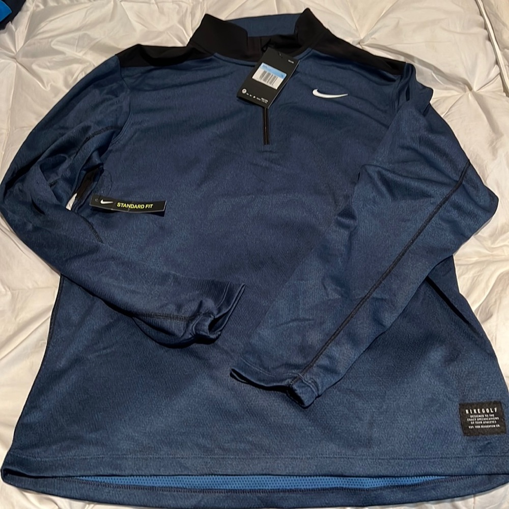 Nike Golf Dri-Fit 1/4 zip pullover. New with tags. Men’s size medium blue/black